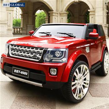 Ô tô điện trẻ em dáng Land Rover BBT-8989 màu đỏ sơn ghế da, bánh cao su12V10AH